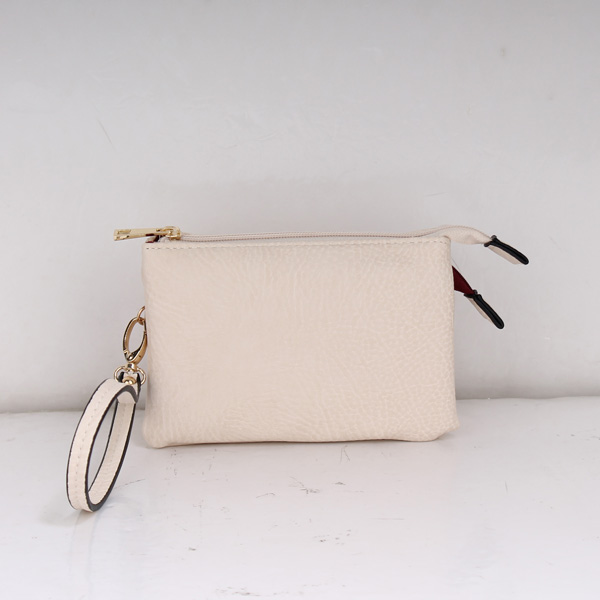 black and beige clutch bag